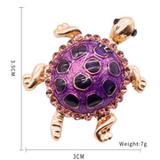 Tortoise drip brooch